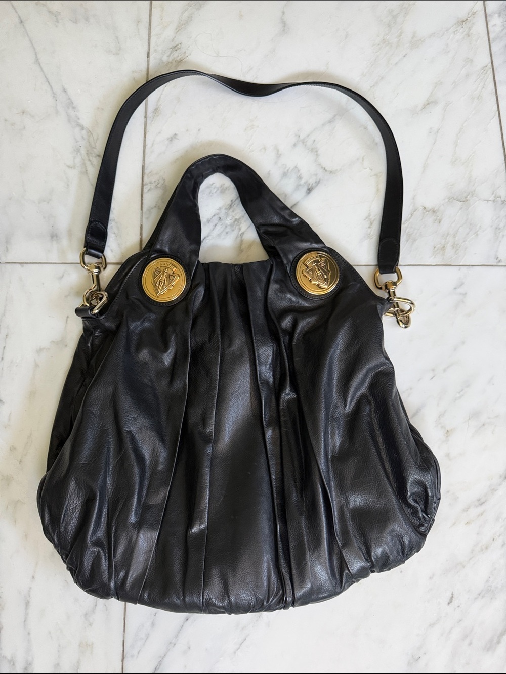 Gucci Black Leather Hobo Bag with Gold Medallions